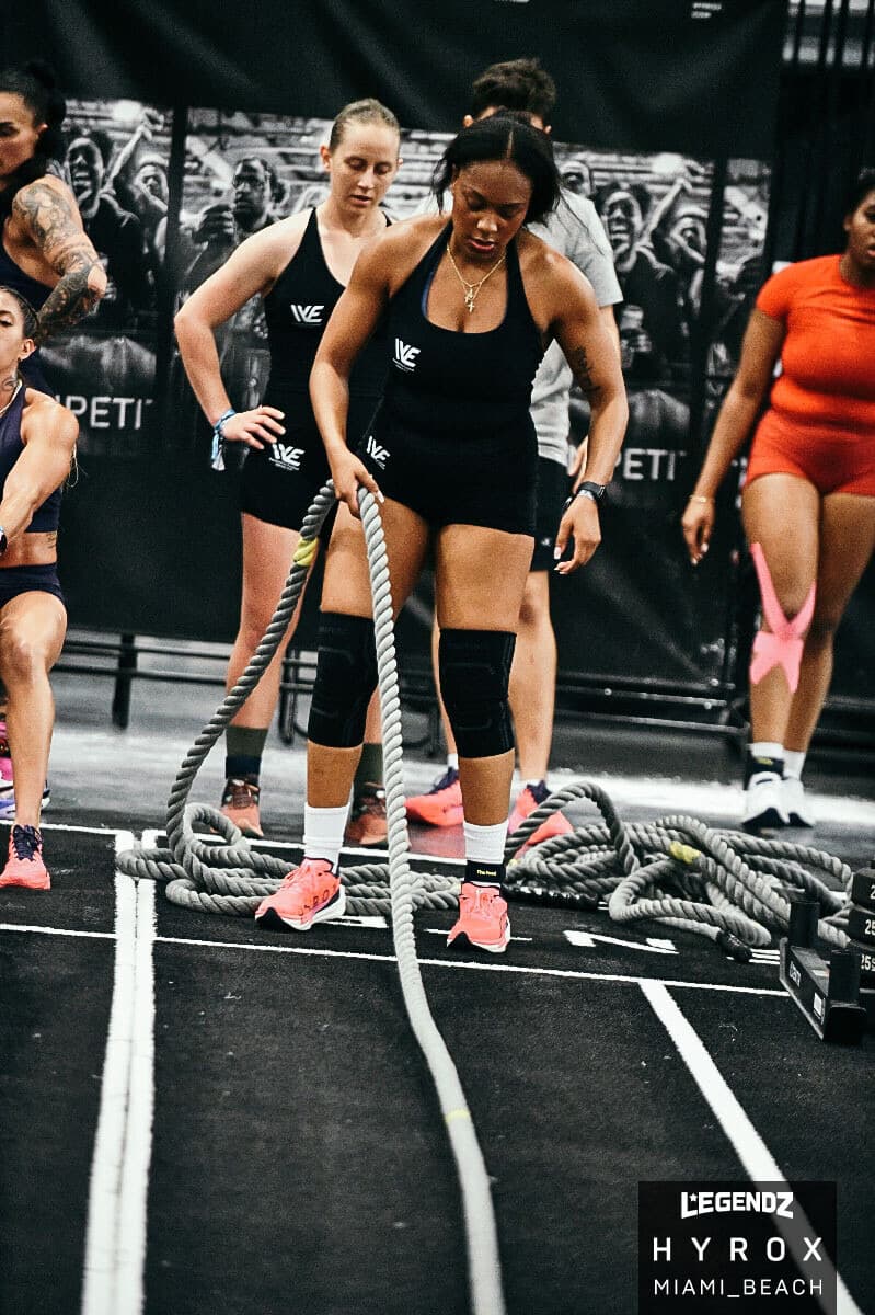Athlete on the rope pull station at HYROX